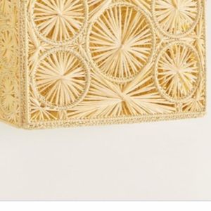 A beautiful handmade raffia fabric design upper braided crossbody strap bag.